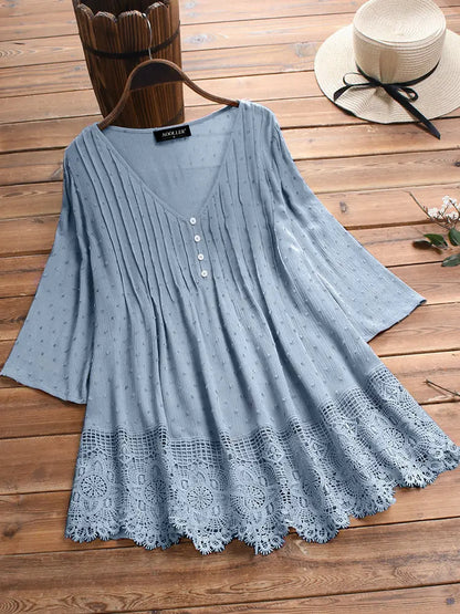 Bluză din șifon jacquard cu model de dantelă, decolteu în V și design cu umerii goi.