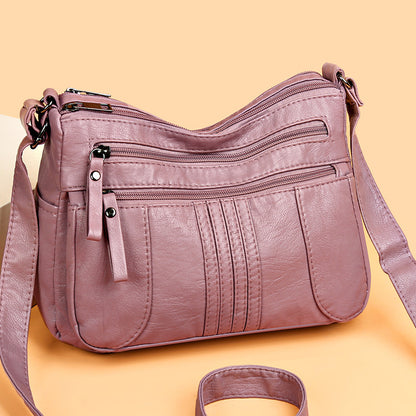 🥰【Ofertă specială pentru o perioadă limitată】👜Geantă de umăr nouă, de mare capacitate, din piele moale, disponibilă în patru culori