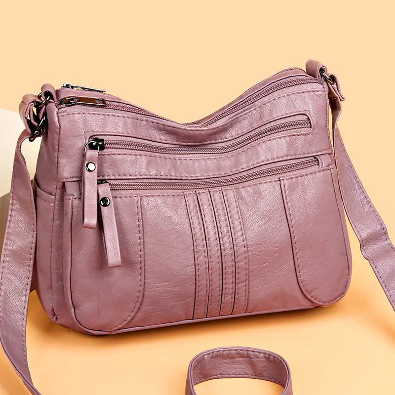 🥰【Ofertă specială pentru o perioadă limitată】👜Geantă de umăr nouă, de mare capacitate, din piele moale, disponibilă în patru culori