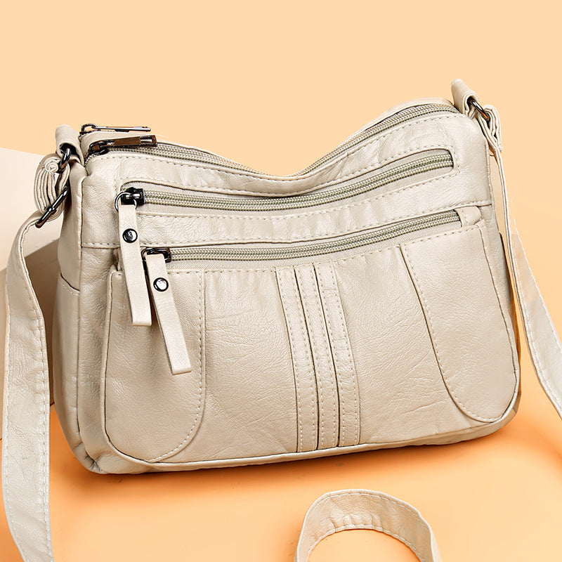🥰【Ofertă specială pentru o perioadă limitată】👜Geantă de umăr nouă, de mare capacitate, din piele moale, disponibilă în patru culori