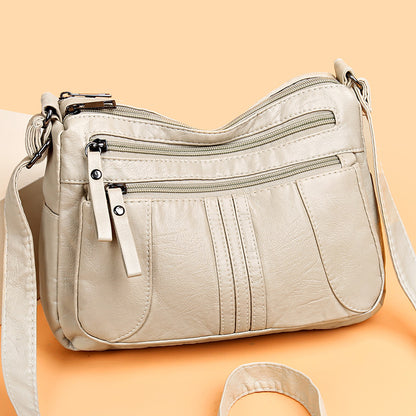 🥰【Ofertă specială pentru o perioadă limitată】👜Geantă de umăr nouă, de mare capacitate, din piele moale, disponibilă în patru culori
