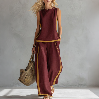 🔥😍【Top + Pantaloni】Set nou și modern din două piese pentru femei: top fără mâneci cu detalii contrastante și pantaloni cu croi larg