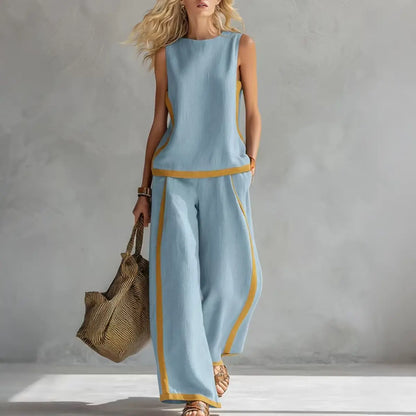 🔥😍【Top + Pantaloni】Set nou și modern din două piese pentru femei: top fără mâneci cu detalii contrastante și pantaloni cu croi larg
