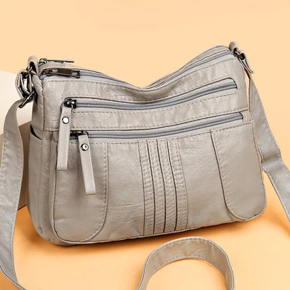 🥰【Ofertă specială pentru o perioadă limitată】👜Geantă de umăr nouă, de mare capacitate, din piele moale, disponibilă în patru culori