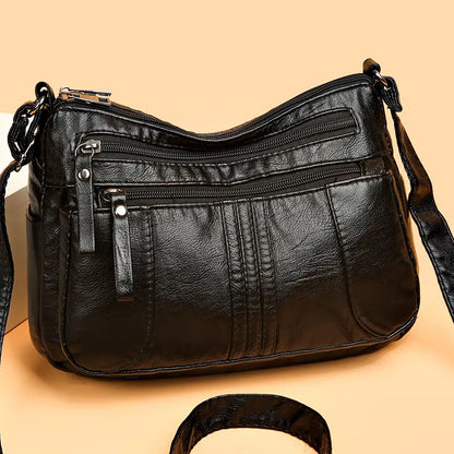 🥰【Ofertă specială pentru o perioadă limitată】👜Geantă de umăr nouă, de mare capacitate, din piele moale, disponibilă în patru culori
