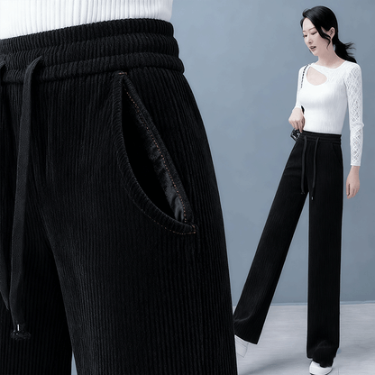 🔥【Compre uno y llévese otro gratis】 👖Nuevos pantalones casuales de terciopelo con perneras anchas, muy cómodos de usar.
